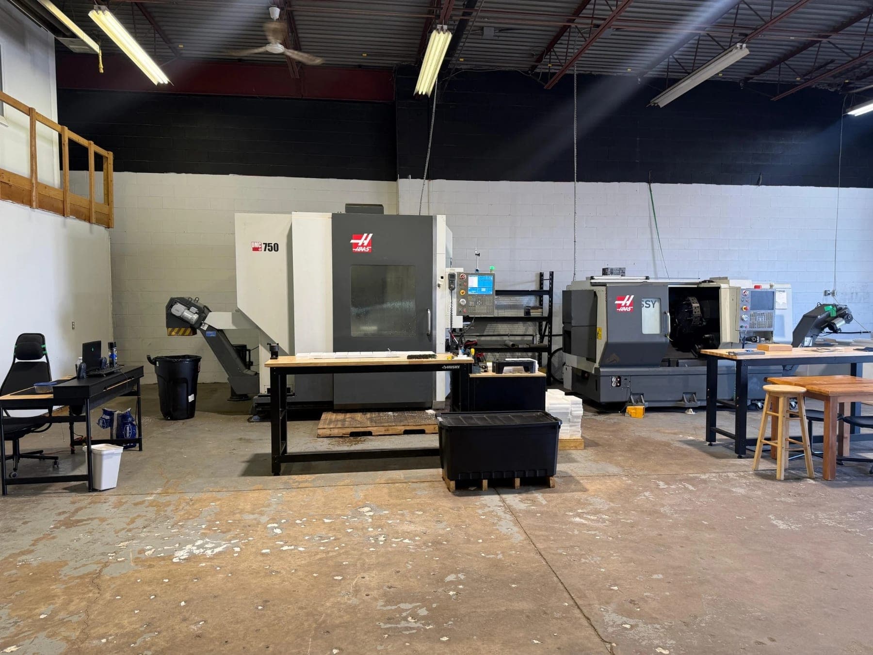 AGT Precision shop floor with HAAS lathe and HAAS UMC-750